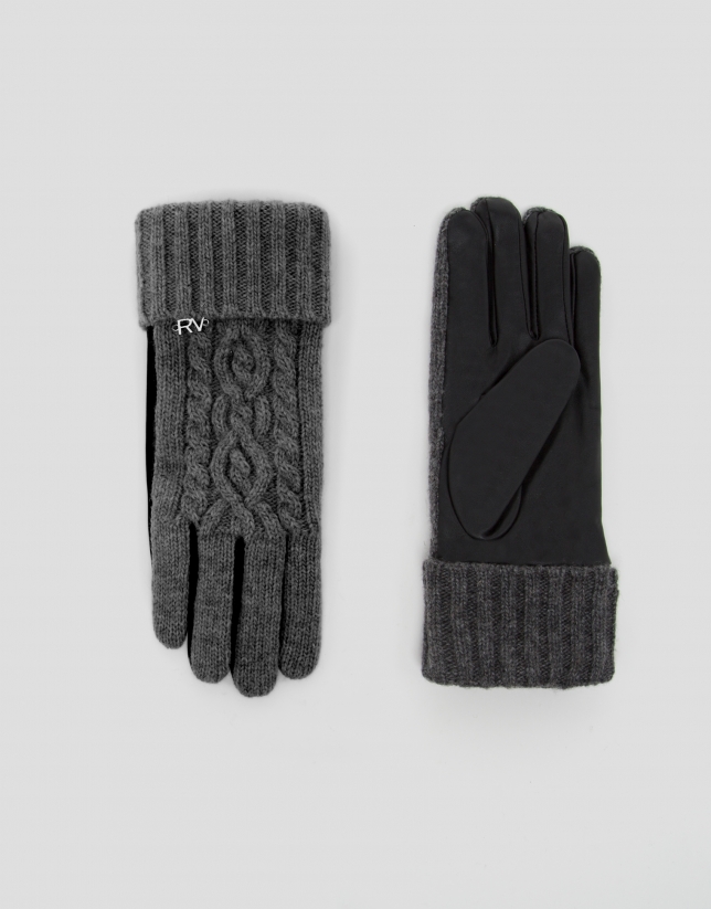 Black leather and knit gloves with gray cable-stitch design