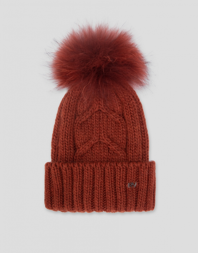 Brick red knit cap with herringbone design and ribbing