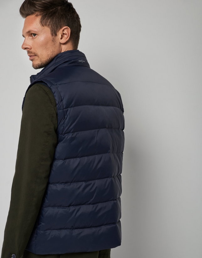 Navy blue and white quilted vest