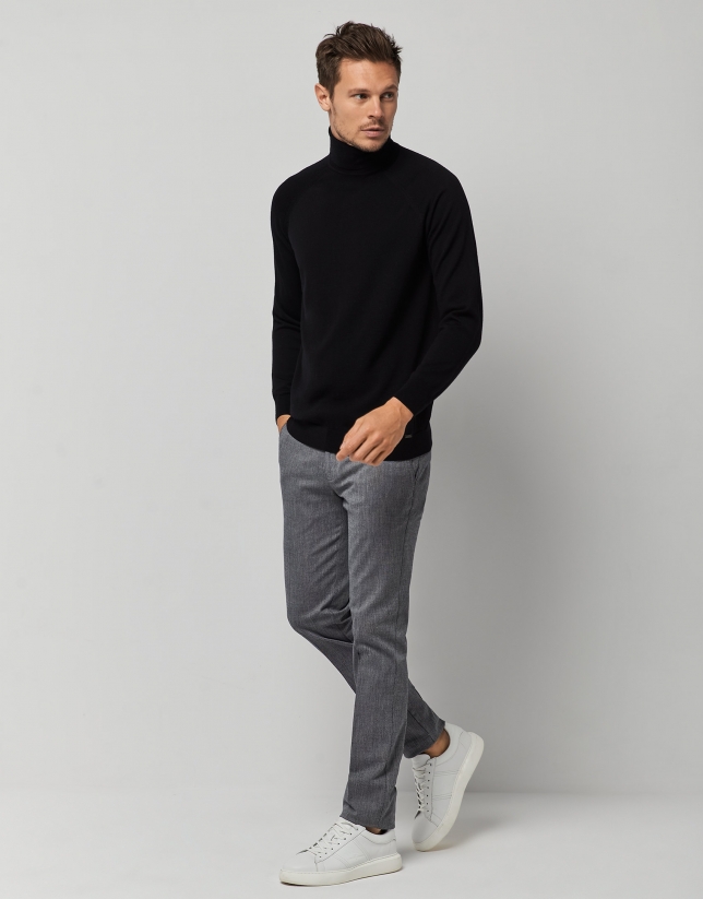 Black melange wool sweater with a turtleneck collar