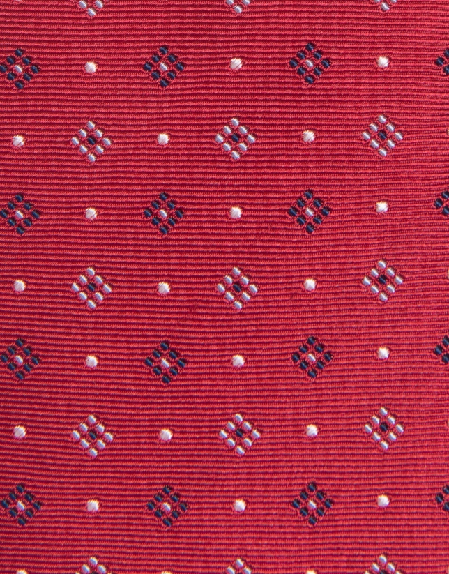 Red silk tie with a beige and navy blue floral print jacquard