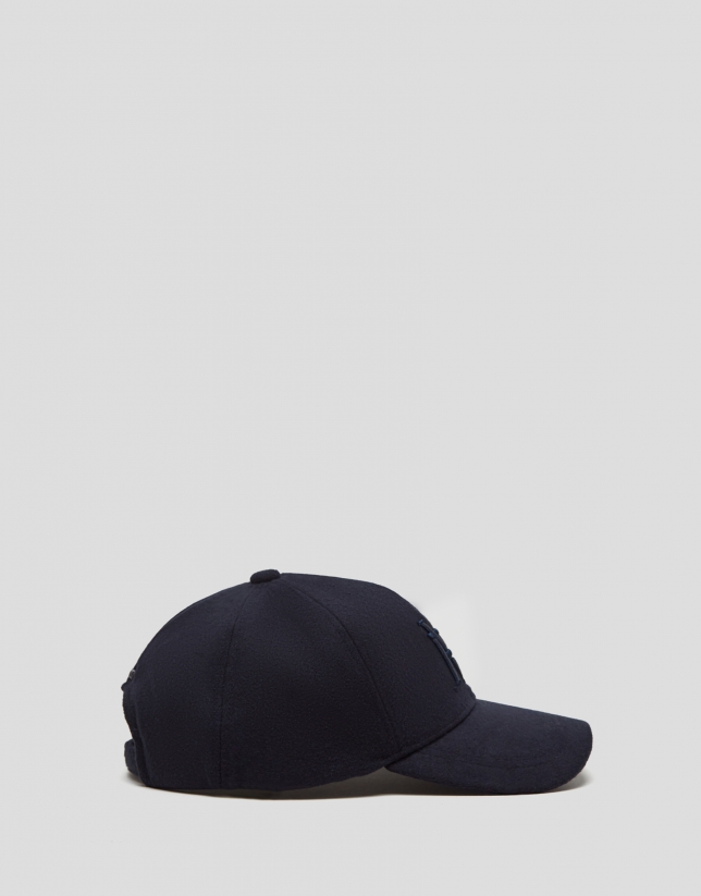Navy blue felt baseball cap with embroidered design
