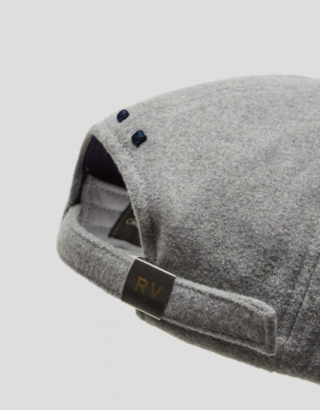 Gray felt baseball cap with embroidered design