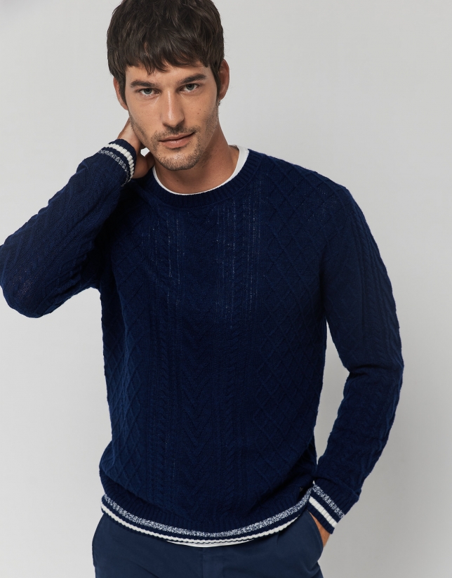 Blue cable-knit wool sweater with stripes on the cuffs