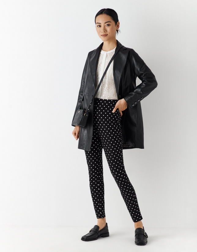 Black knit leggings with dotted print