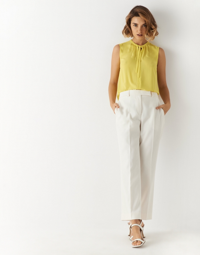 Yellow V-neck top with ribbon