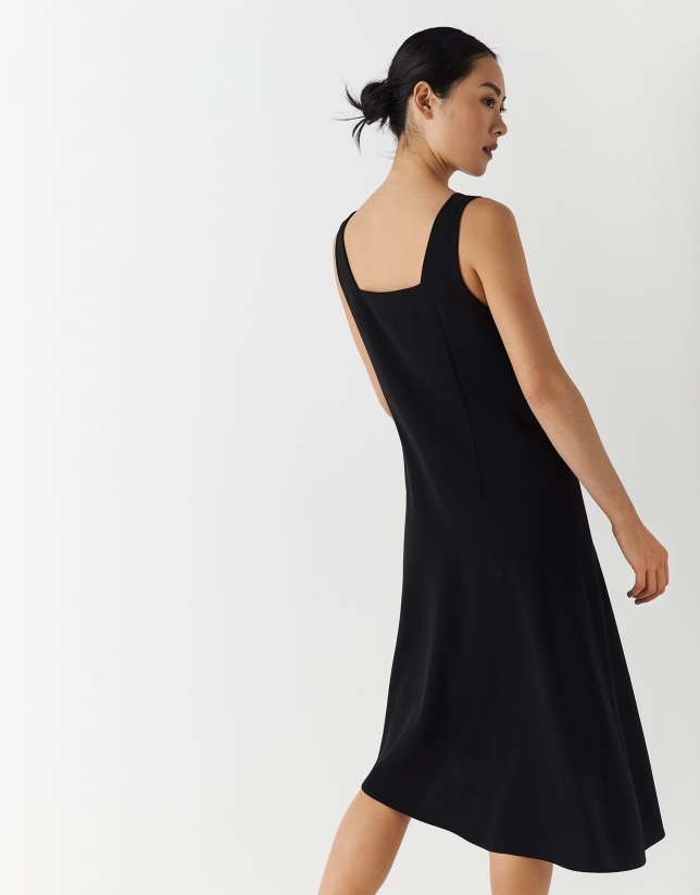 Black crepe midi dress with straps and asymmetric hem