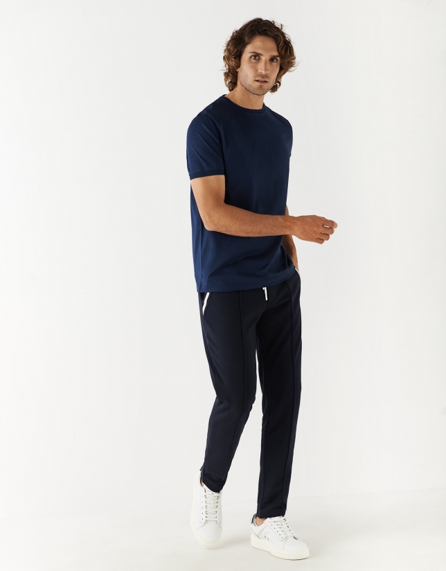 Navy blue jogging pants with white contrasts