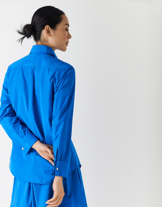 Klein blue shirt with rounded hem