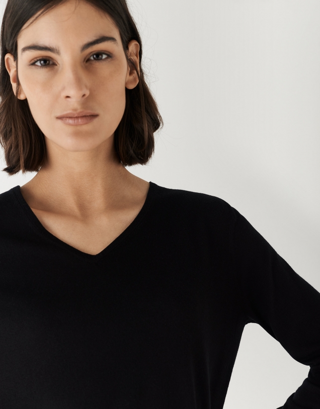 Black fine-knit V-neck sweater