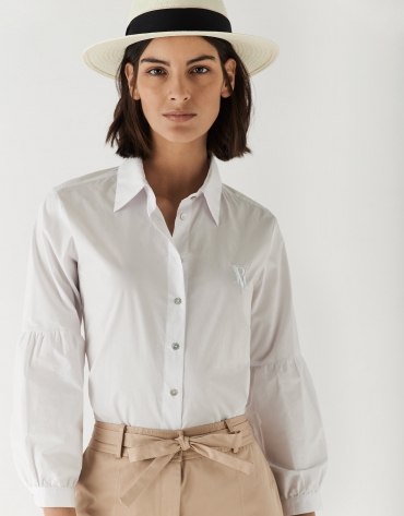 White cotton blouse with puffed sleeves