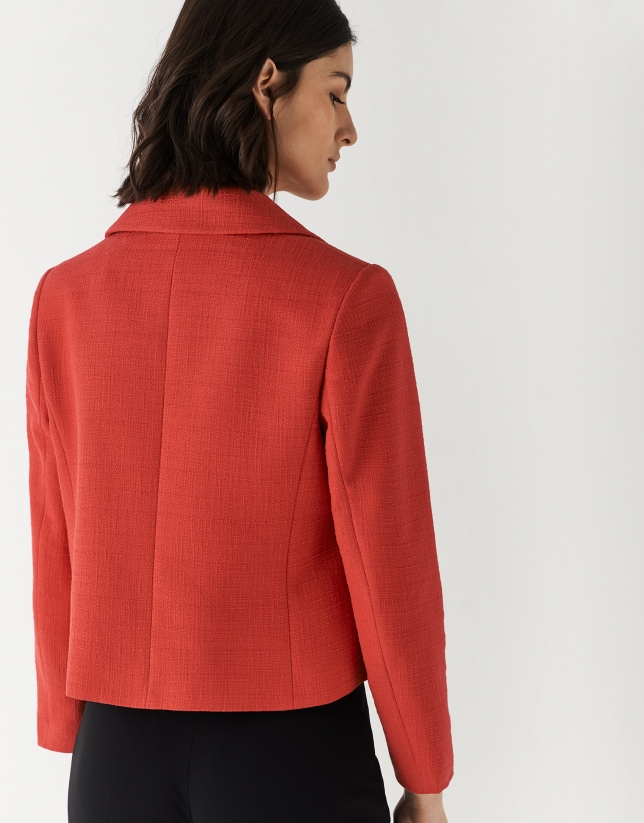 Short red Chanel-style jacket