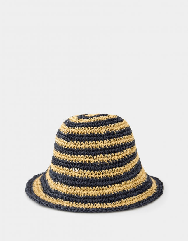 Navy blue and beige crocheted fisherman-style cap