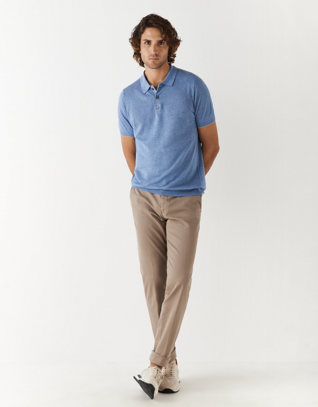Light blue knit polo shirt with short sleeves