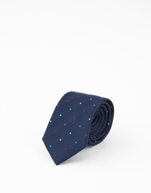 Navy blue silk tie with blue and red polka dots