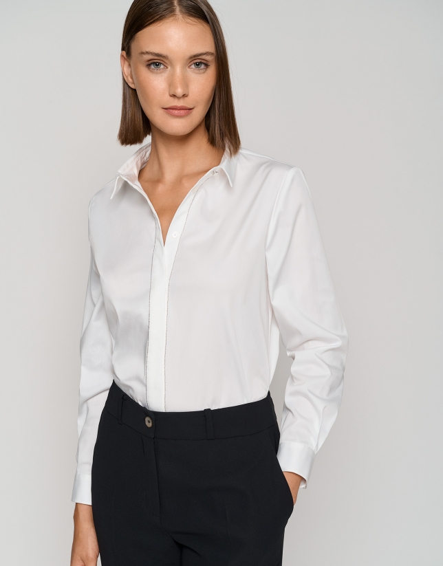 White blouse with glitter on flap