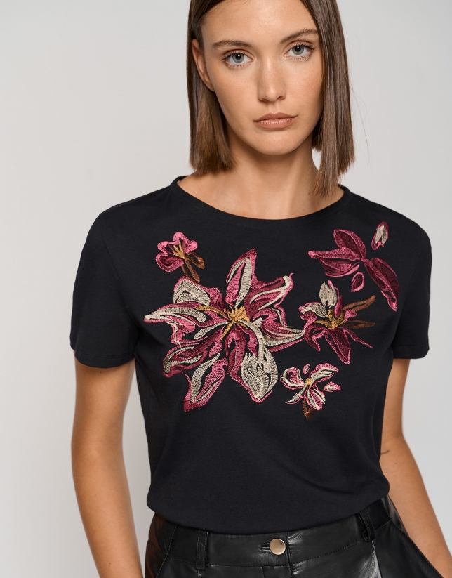 Black cotton top with embroidered floral design