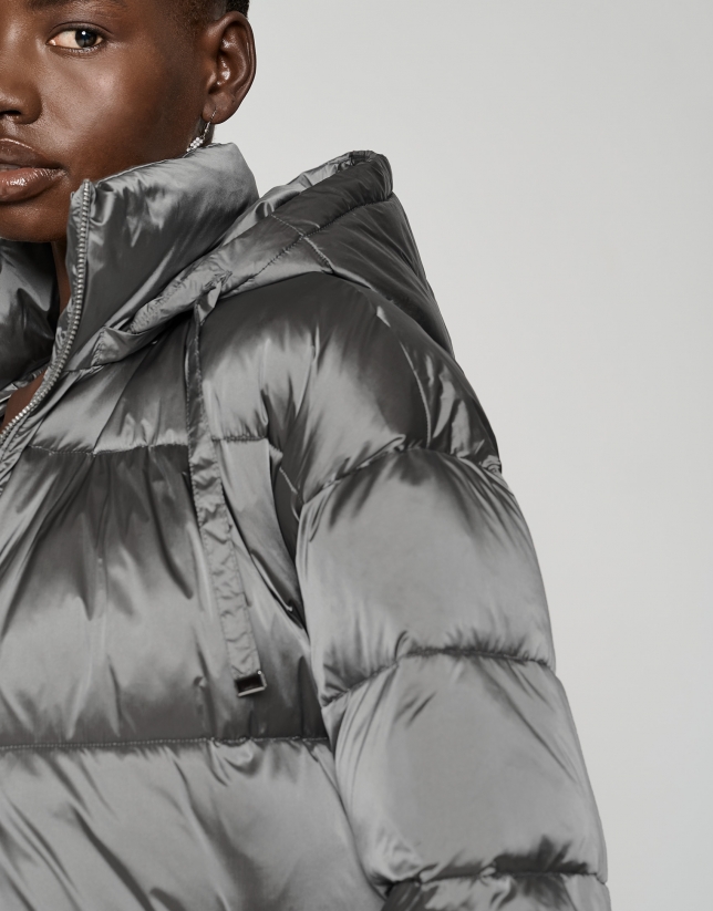 Gray quilted windbreaker with hood and side slits 