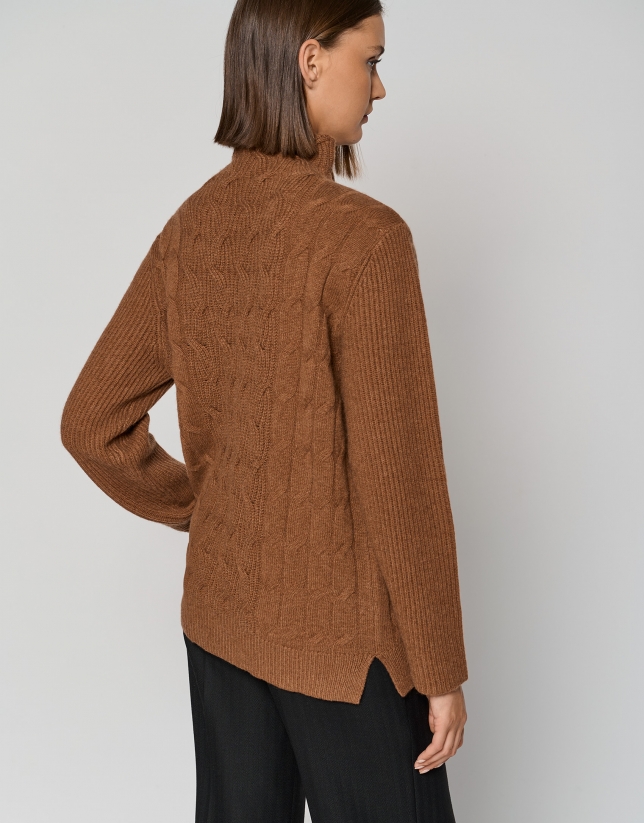 Brown sweater with cable stitching and ribbing
