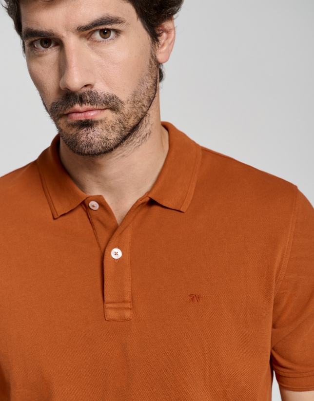Dyed dark orange short sleeved polo shirt