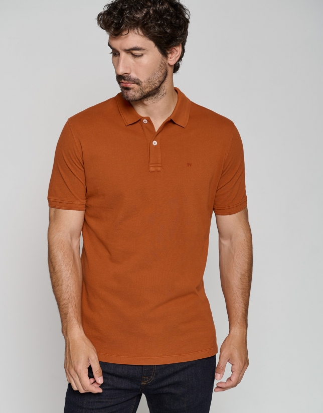 Dyed dark orange short sleeved polo shirt
