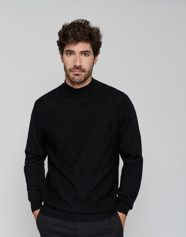 Black wool sweater with elaborate knit