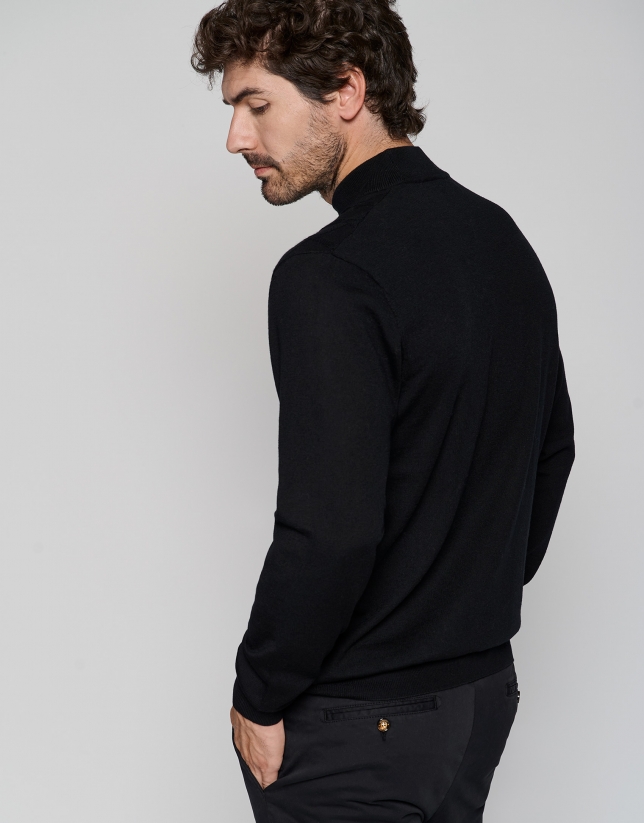 Black wool sweater with elaborate knit
