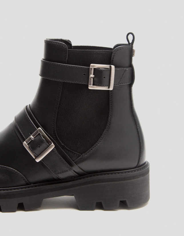 Black leather ankle boot with track sole