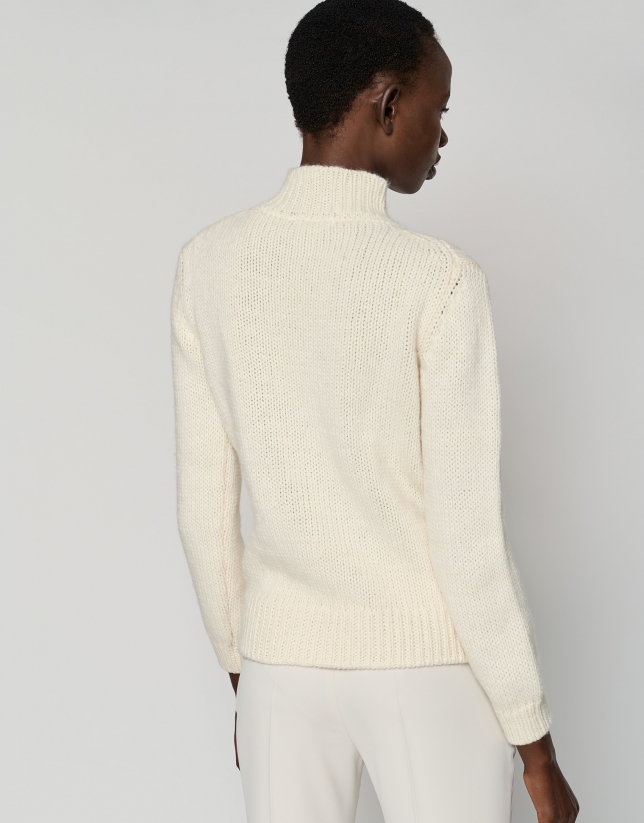 Ecru sweater with braided knit