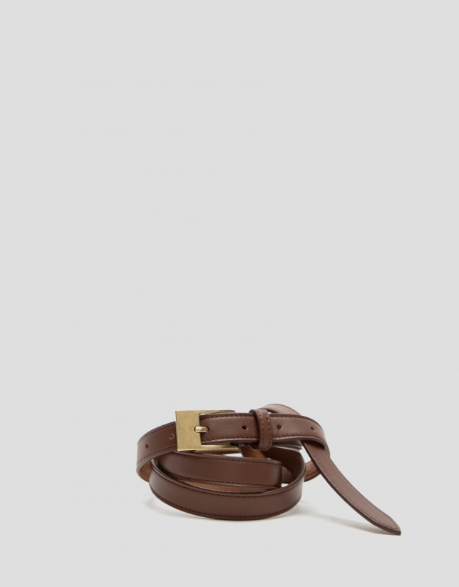 Belt to tie with brown leather buckle