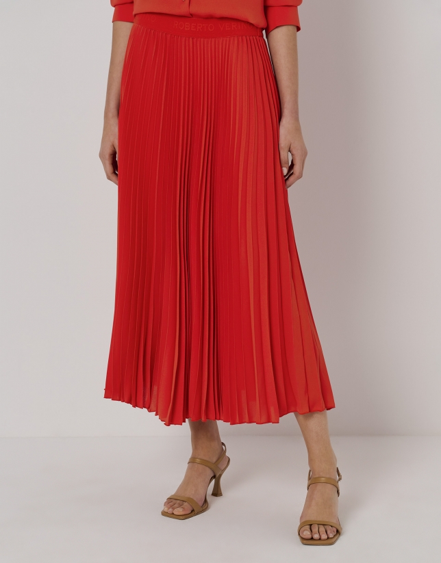 Red pleated midi skirt