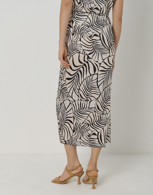 Sarong-style twill skirt with black and cream leaf print