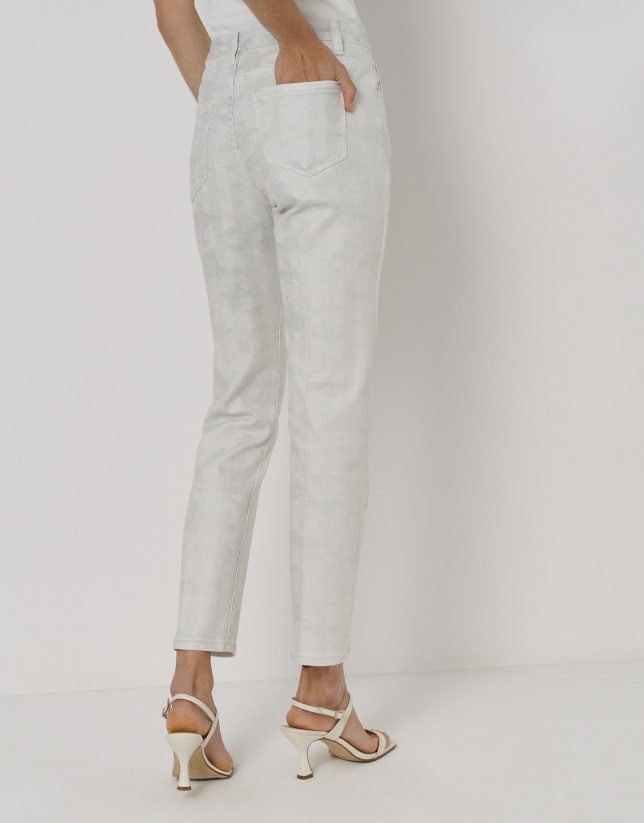 White pants with five pockets and rhinestones