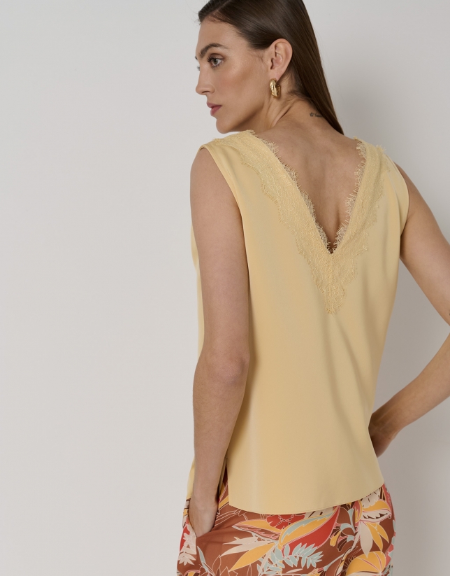 Yellow satin top with lace V-neck