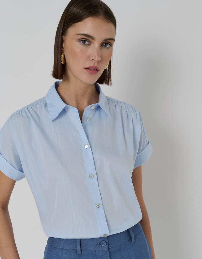 Blue cotton blouse with shiny threading
