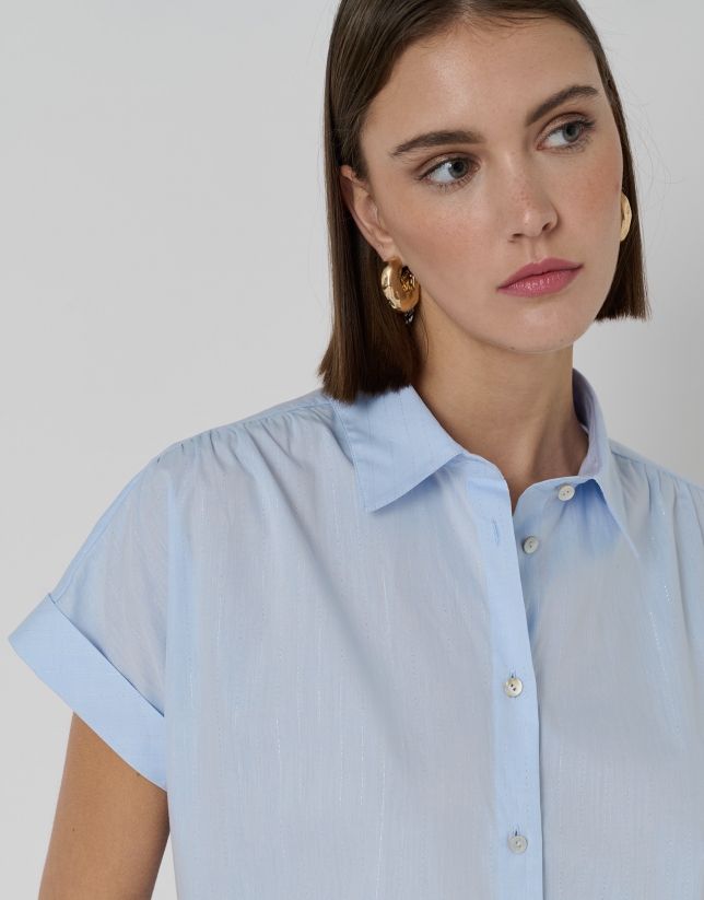 Blue cotton blouse with shiny threading