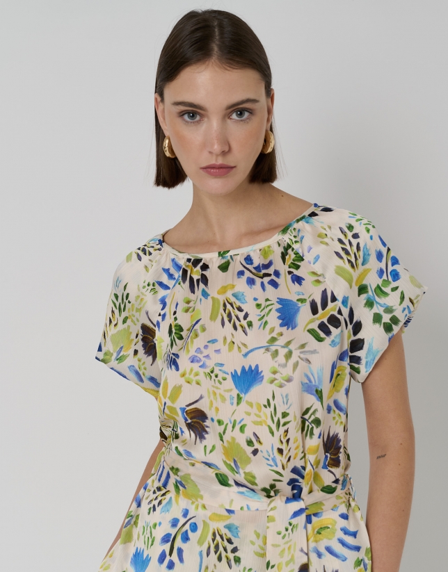 Cheesecloth blouse with round, puckered neckline and blue floral print