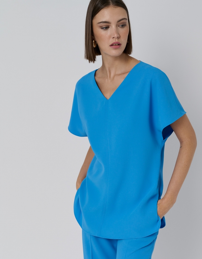 Blue crepe oversize blouse with V-neck