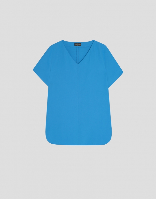 Blue crepe oversize blouse with V-neck