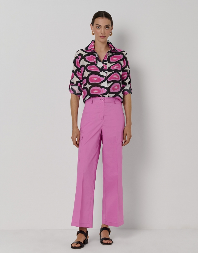 Pink and black print blouse with roll-up sleeves