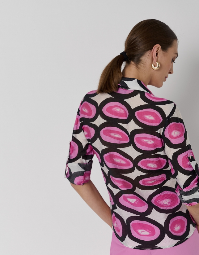 Pink and black print blouse with roll-up sleeves