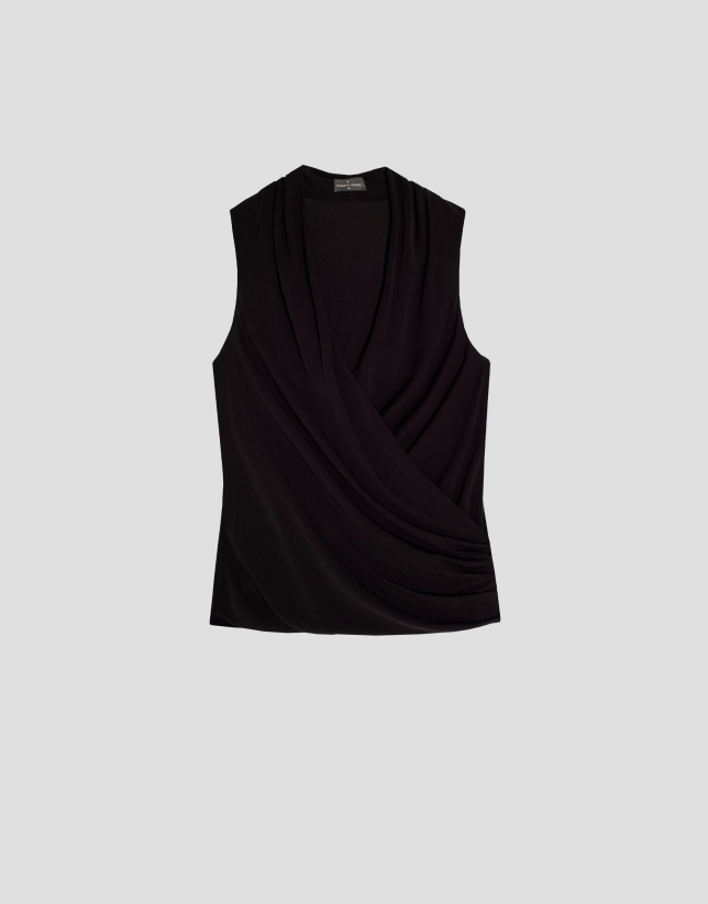 Black knit top with draped collar