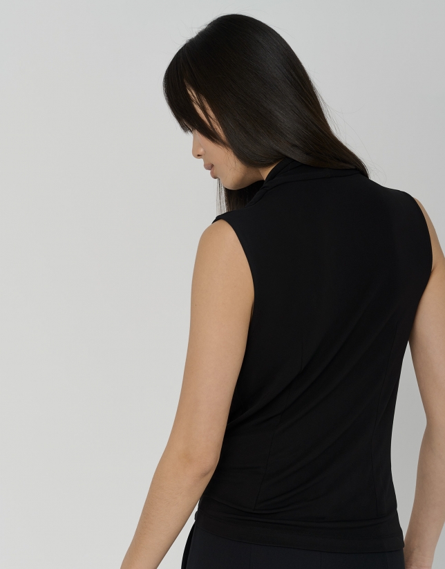 Black knit top with draped collar