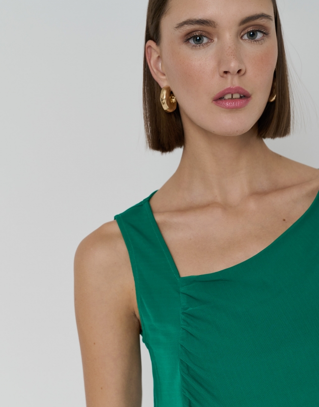 Green knit top with puckered shoulders