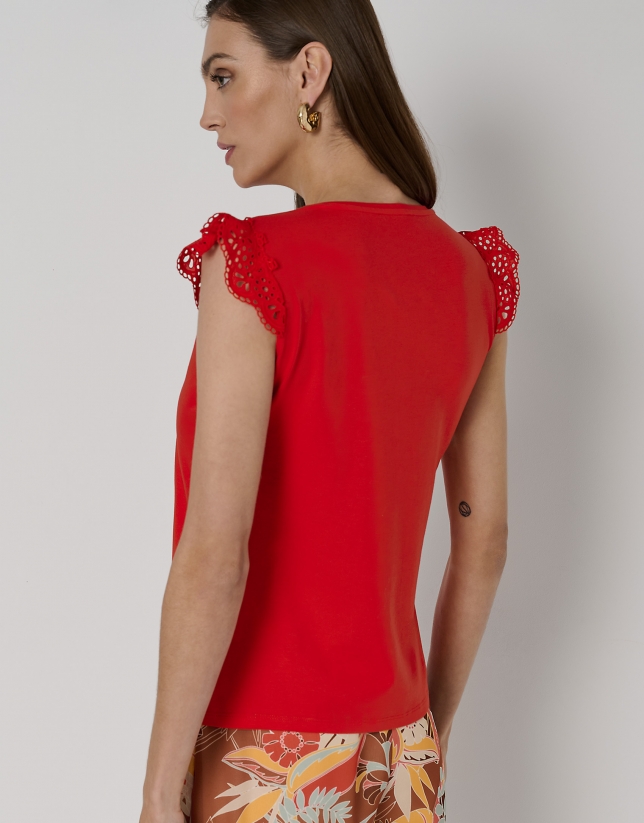 Red cotton top with V-neck and lace in the front