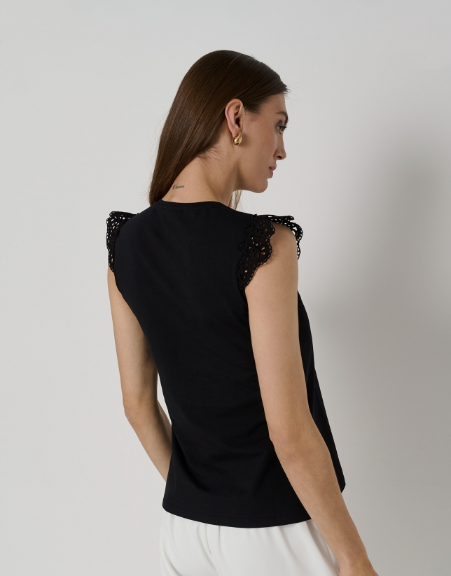 Black cotton top with V-neck and lace in the front