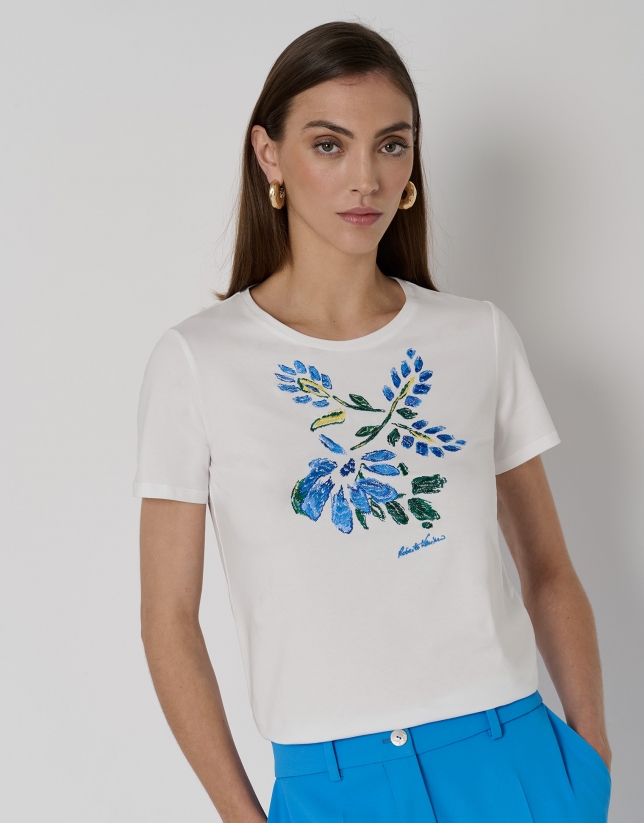 White cotton top with embroidered blue flowers