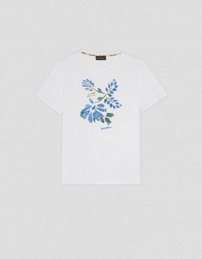 White cotton top with embroidered blue flowers