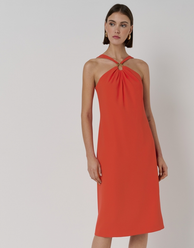 Red midi dress with puckered neckline and large ring