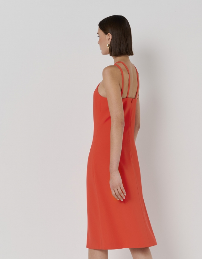 Red midi dress with puckered neckline and large ring
